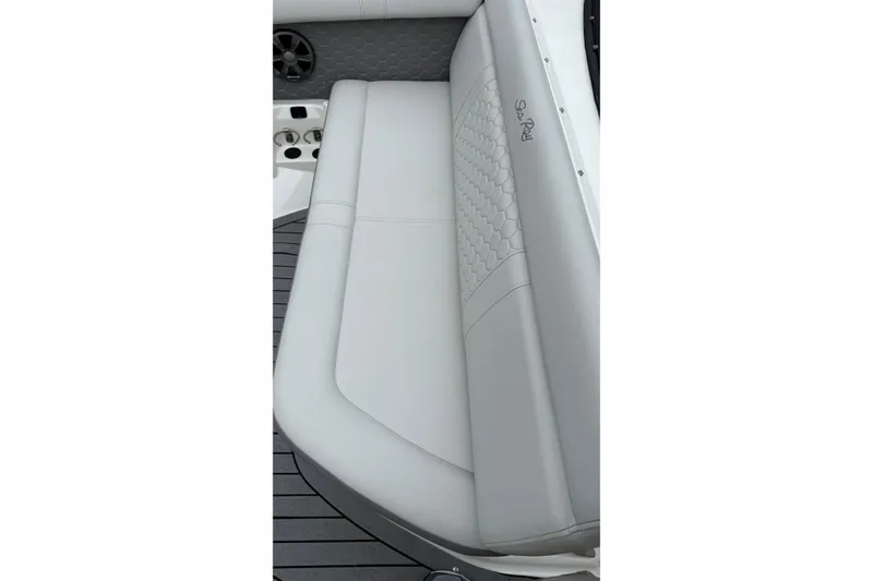 Slide: The Image of 2021 Sea Ray SDX 250 boat seat with elegant gray upholstery and textured design. - 14