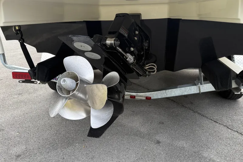 Slide: The Image of 2021 Sea Ray SDX 250 boat propeller and stern drive on trailer. - 3