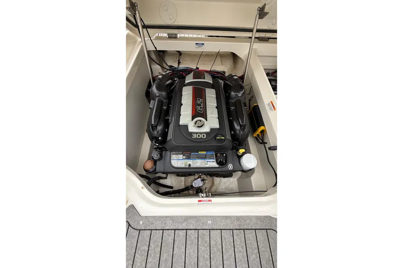 Slide: The Image of Engine compartment of a 2021 Sea Ray SDX 250 boat, featuring a 6.2L engine. - 8