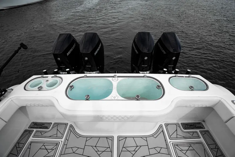 Slide: The Image of 2024 Front Runner 37 Catamaran with Mercury engines and live wells on deck. - 23