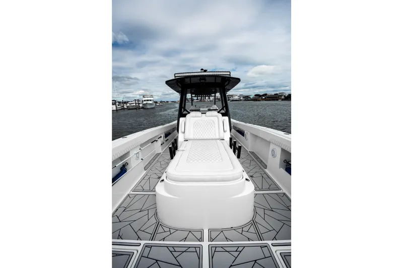 Slide: The Image of 2024 Front Runner 37 Catamaran with sleek deck design and comfortable seating. - 8