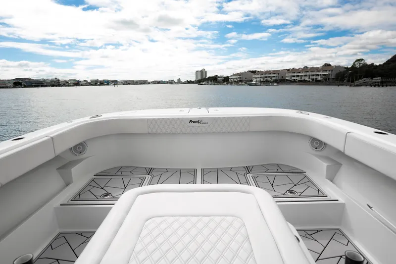 Slide: The Image of 2024 Front Runner 37 Catamaran interior with scenic waterfront view. - 9