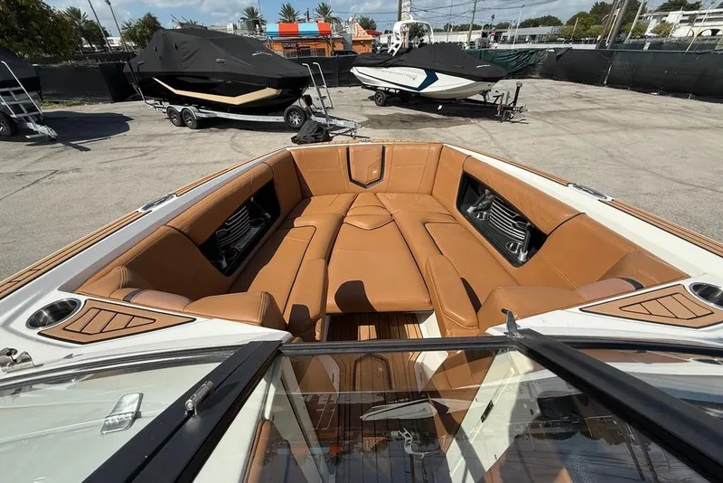 Slide: The Image of 2018 Nautique Super Air Nautique G25 Coastal Edition with tan interior seating. - 5