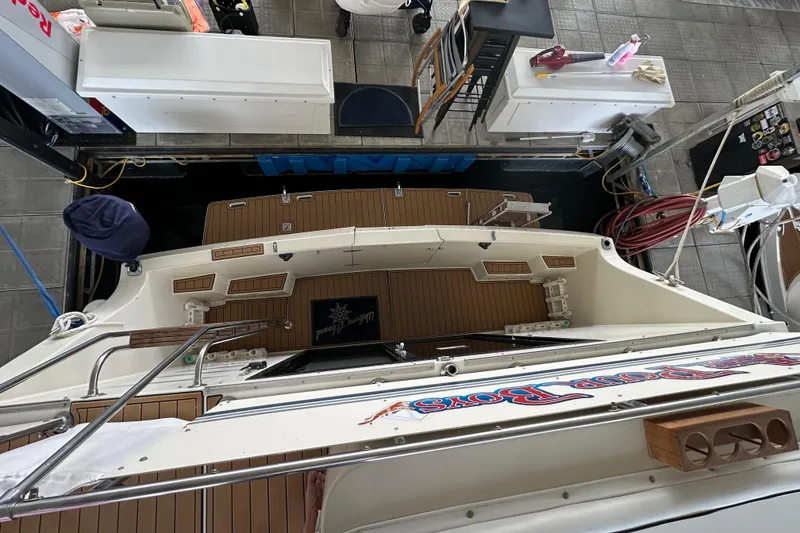 Slide: The Image of Overhead view of a 1990 Blue Water 42 Coastal Cruiser docked indoors. - 12