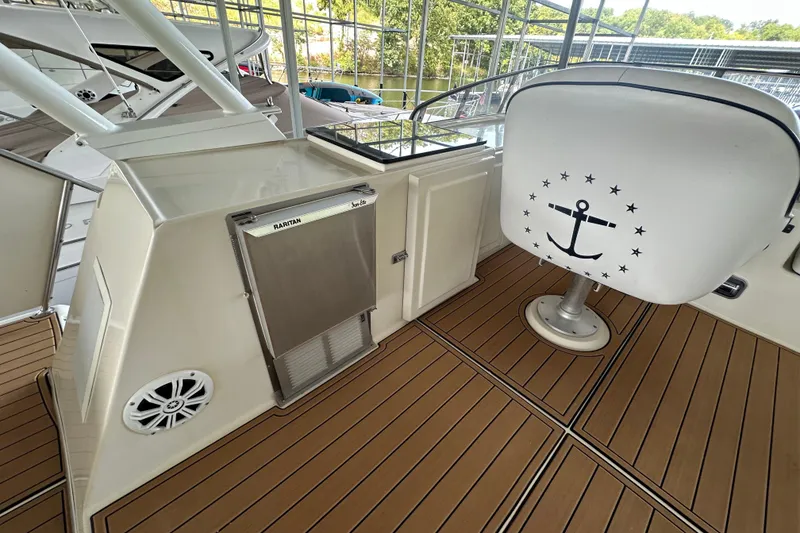 Slide: The Image of 1990 Blue Water 42 Coastal Cruiser deck with seating and Raritan ice maker. - 24