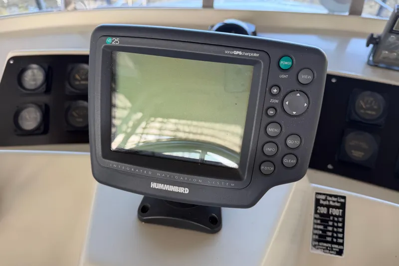 Slide: The Image of Humminbird sonar GPS chartplotter on 1990 Blue Water 42 Coastal Cruiser dashboard. - 27