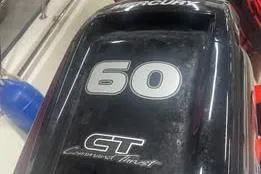 Slide: The Image of Outboard motor of a 2021 Boston Whaler 150 Montauk with 60 HP engine. - 8