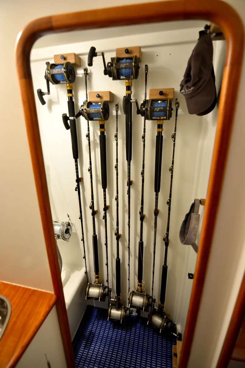 Slide: The Image of Control panel of a 2007 Gamefisherman 42 Walkaround boat with navigation instruments. - 16