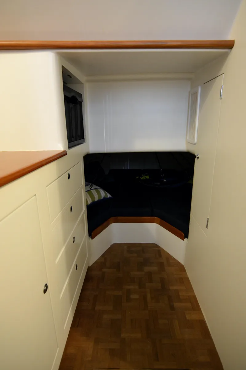 Slide: The Image of Control panel of 2007 Gamefisherman 42 Walkaround boat with navigation displays. - 17