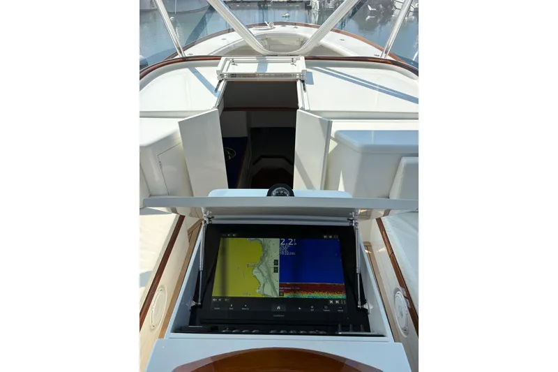 Slide: The Image of 2007 Gamefisherman 42 Walkaround boat, aerial view of bow in marina. - 21