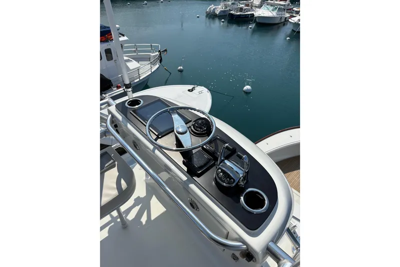 Slide: The Image of Storage compartment on 2007 Gamefisherman 42 Walkaround with chain and rope. - 25