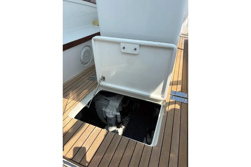 Slide: The Image of Engine room of 2007 Gamefisherman 42 Walkaround with visible pipes and machinery. - 35