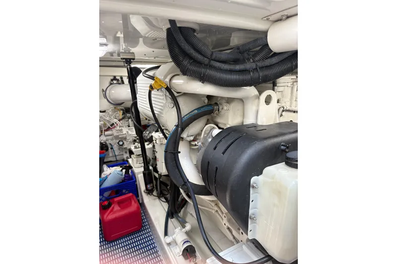 Slide: The Image of Engine room of 2007 Gamefisherman 42 Walkaround, showcasing electrical components and wiring. - 37