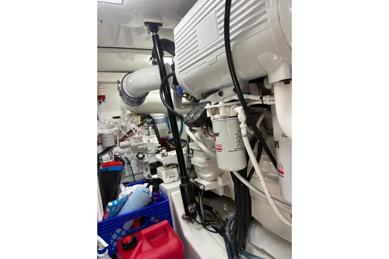 Slide: The Image of Engine room of 2007 Gamefisherman 42 Walkaround, showcasing electrical components and wiring. - 38