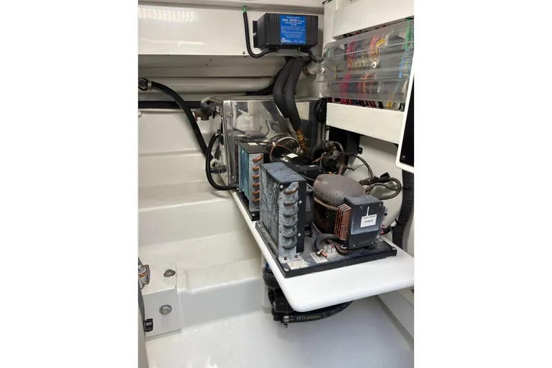 Slide: The Image of Engine room of 2007 Gamefisherman 42 Walkaround, showcasing dual engines and components. - 44