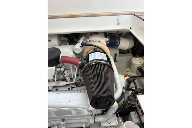 Slide: The Image of Electrical system inside 2007 Gamefisherman 42 Walkaround boat, featuring wiring and components. - 54