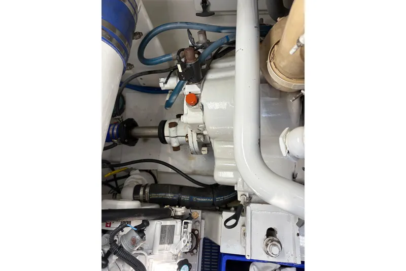 Slide: The Image of Electrical compartment of 2007 Gamefisherman 42 Walkaround, showcasing wiring and control panels. - 55