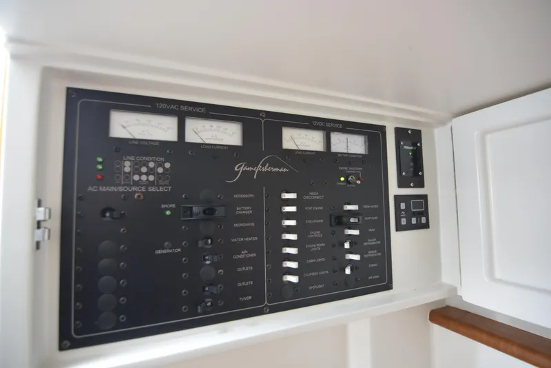 Slide: The Image of Electrical control panel on a 2007 Gamefisherman 42 Walkaround boat. - 8