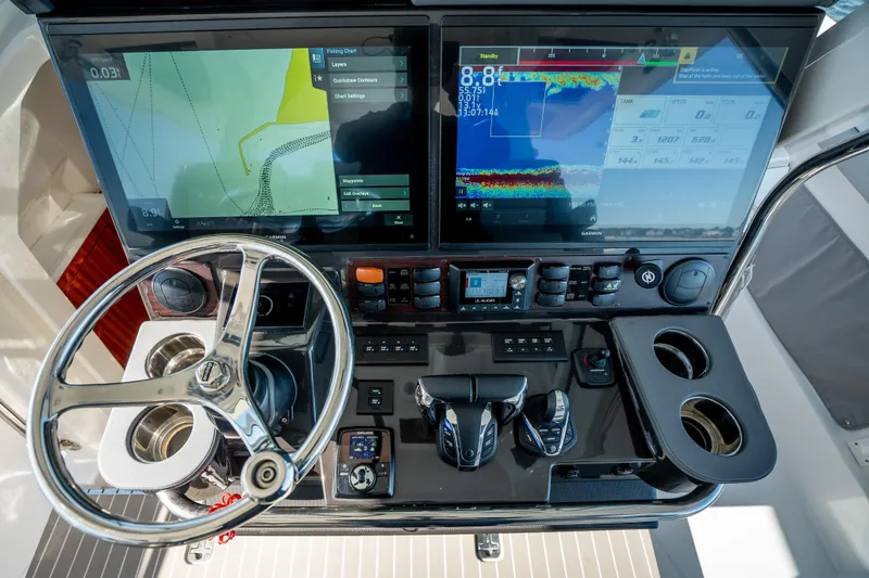 Slide: The Image of 2023 Pursuit S 428 Sport helm with dual displays and advanced controls. - 15