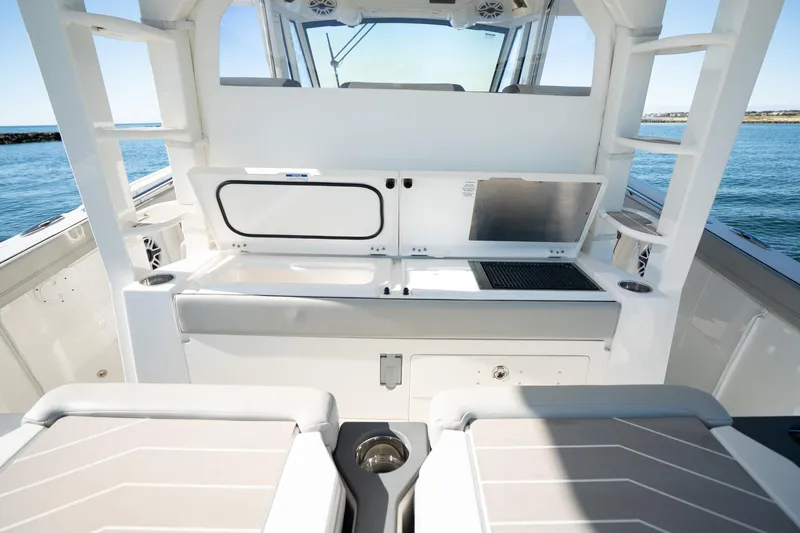 Slide: The Image of 2023 Pursuit S 428 Sport boat interior with sleek design and modern amenities. - 21