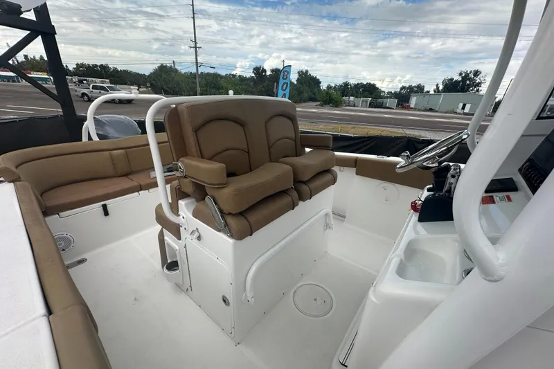 Slide: The Image of Open storage compartment on a 2020 Sea Hunt Ultra 255 SE boat. - 109