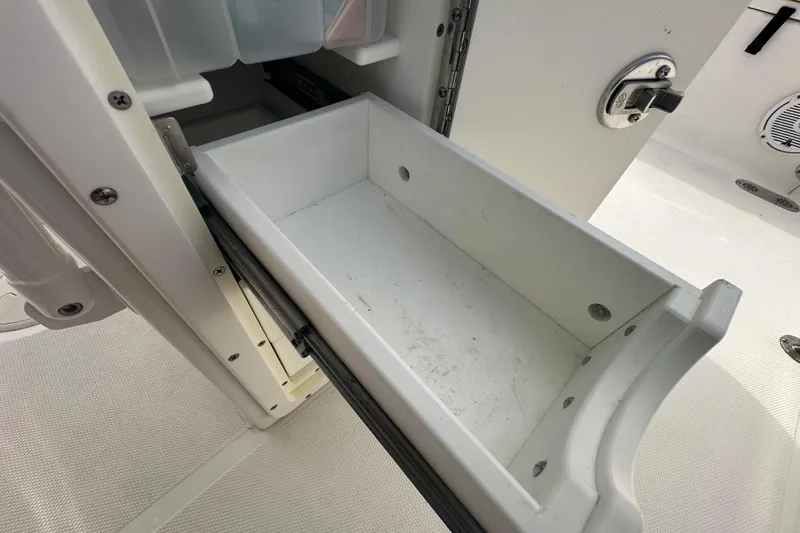 Slide: The Image of 2020 Sea Hunt Ultra 255 SE boat seating with cushioned armrests. - 117