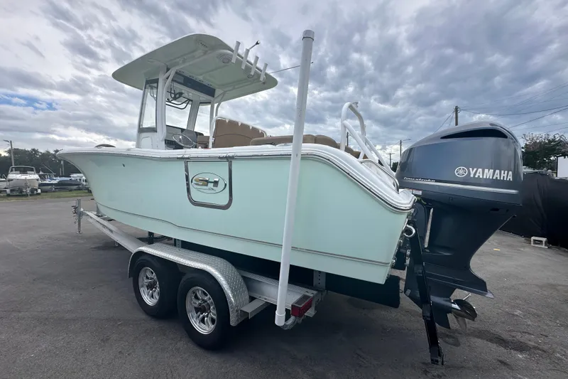 Slide: The Image of 2020 Sea Hunt Ultra 255 SE boat on trailer with Yamaha outboard motor. - 12