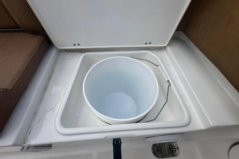 Slide: The Image of Interior view of 2020 Sea Hunt Ultra 255 SE boat with brown seating. - 138