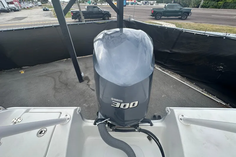Slide: The Image of 2020 Sea Hunt Ultra 255 SE boat hatch with stainless steel hinges and latch. - 142