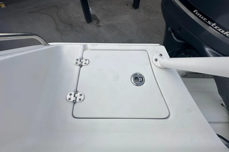 Slide: The Image of 2020 Sea Hunt Ultra 255 SE boat with ABYC and Coosa Composites stickers. - 144