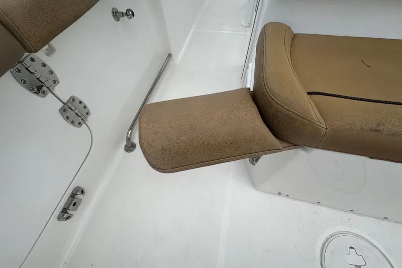 Slide: The Image of 2020 Sea Hunt Ultra 255 SE boat seat with foldable armrest detail. - 32