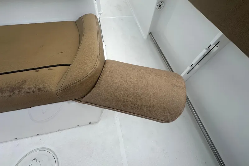 Slide: The Image of 2020 Sea Hunt Ultra 255 SE boat dashboard with steering wheel and controls. - 35