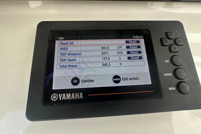 Slide: The Image of Control panel of a 2020 Sea Hunt Ultra 255 SE boat with various switches. - 49