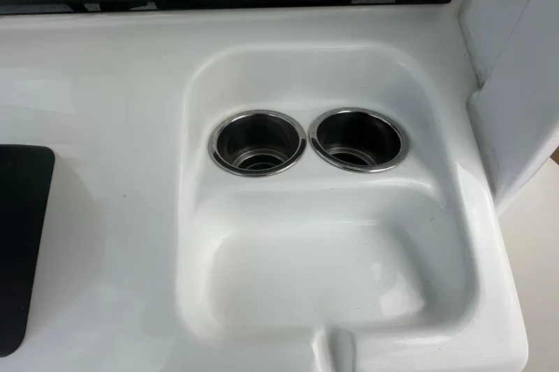 Slide: The Image of Control panel of a 2020 Sea Hunt Ultra 255 SE boat with warning label. - 54