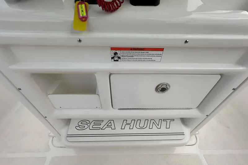 Slide: The Image of Storage compartment on a 2020 Sea Hunt Ultra 255 SE boat. - 58