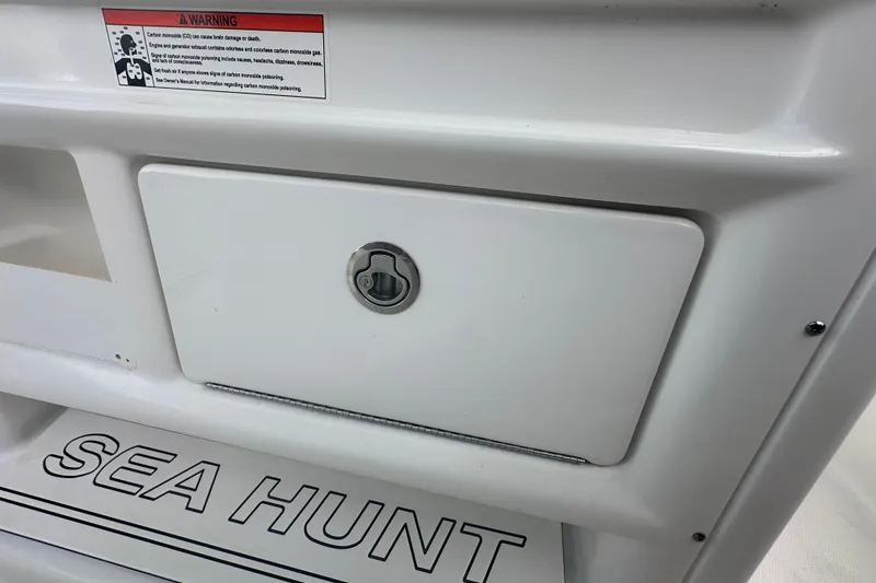Slide: The Image of 2020 Sea Hunt Ultra 255 SE boat interior storage compartment detail. - 59