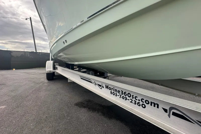 Slide: The Image of 2020 Sea Hunt Ultra 255 SE boat on trailer at Marine360SC dealership. - 6