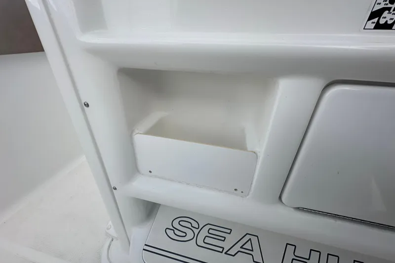 Slide: The Image of Interior view of 2020 Sea Hunt Ultra 255 SE boat with navigation display. - 61