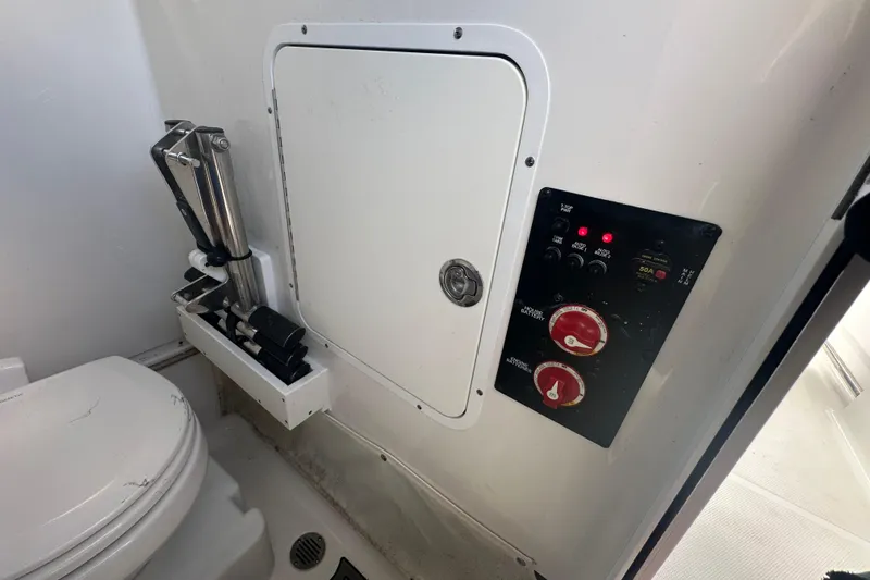 Slide: The Image of 2020 Sea Hunt Ultra 255 SE boat interior with seating and console details. - 70