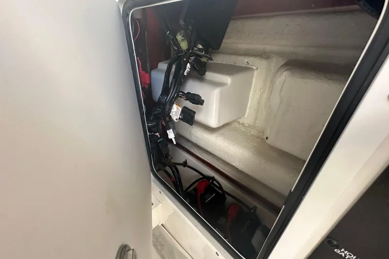 Slide: The Image of 2020 Sea Hunt Ultra 255 SE boat, close-up of model name on white surface. - 71