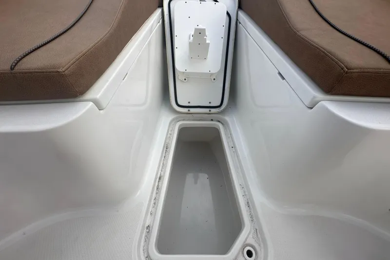 Slide: The Image of 2020 Sea Hunt Ultra 255 SE boat interior storage compartment. - 87