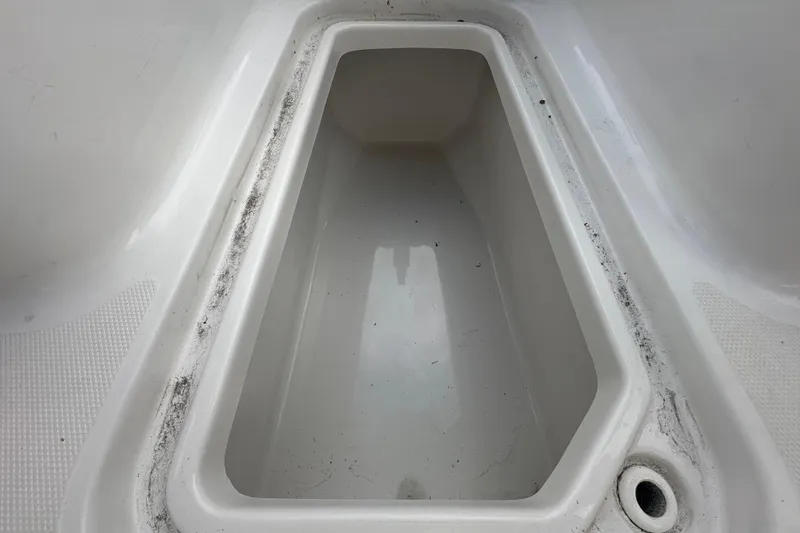 Slide: The Image of Storage compartment on a 2020 Sea Hunt Ultra 255 SE boat. - 88