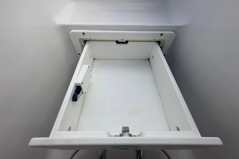 Slide: The Image of Bow of 2020 Sea Hunt Ultra 255 SE boat with storage compartment. - 91