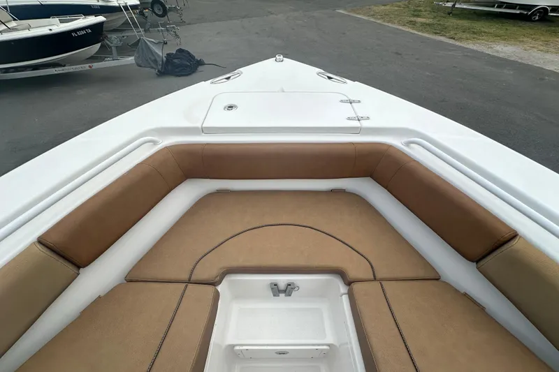 Slide: The Image of Anchor storage compartment on a 2020 Sea Hunt Ultra 255 SE boat. - 92
