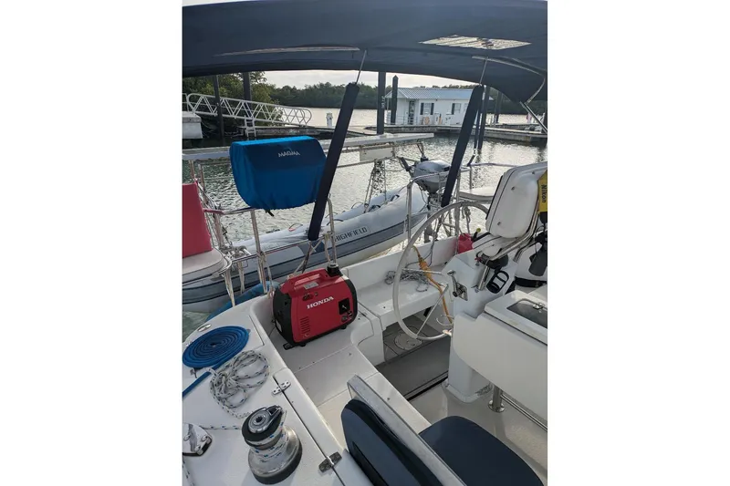 Slide: The Image of Cockpit of 2008 Catalina 350 MkII sailboat with equipment and marina view. - 13