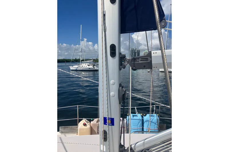 Slide: The Image of Catalina 350 MkII sailboat mast detail, docked with water containers, 2008 model. - 21