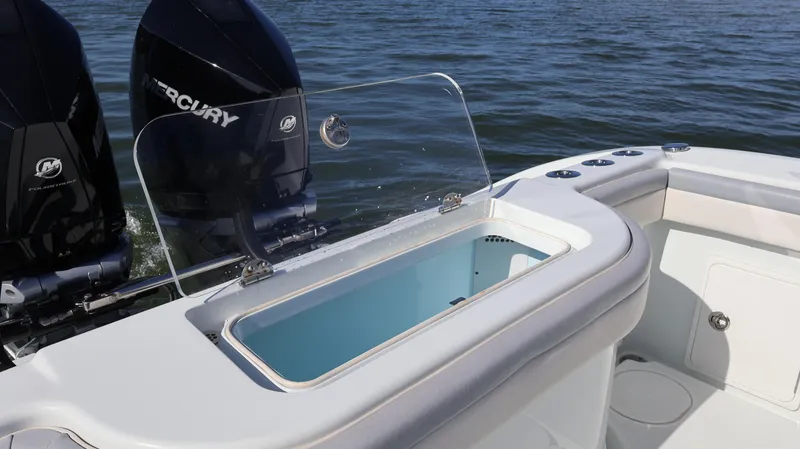 Slide: The Image of 2022 Yellowfin 32 Offshore boat with Mercury engines and open livewell. - 16