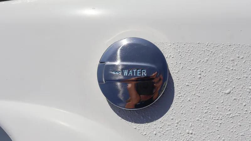 Slide: The Image of Water cap on 2022 Yellowfin 32 Offshore boat. - 18