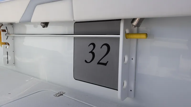 Slide: The Image of 2022 Yellowfin 32 Offshore boat detail with number 32 on the side. - 20