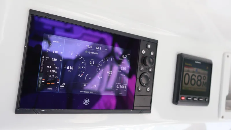 Slide: The Image of Dashboard of 2022 Yellowfin 32 Offshore boat with digital displays. - 36